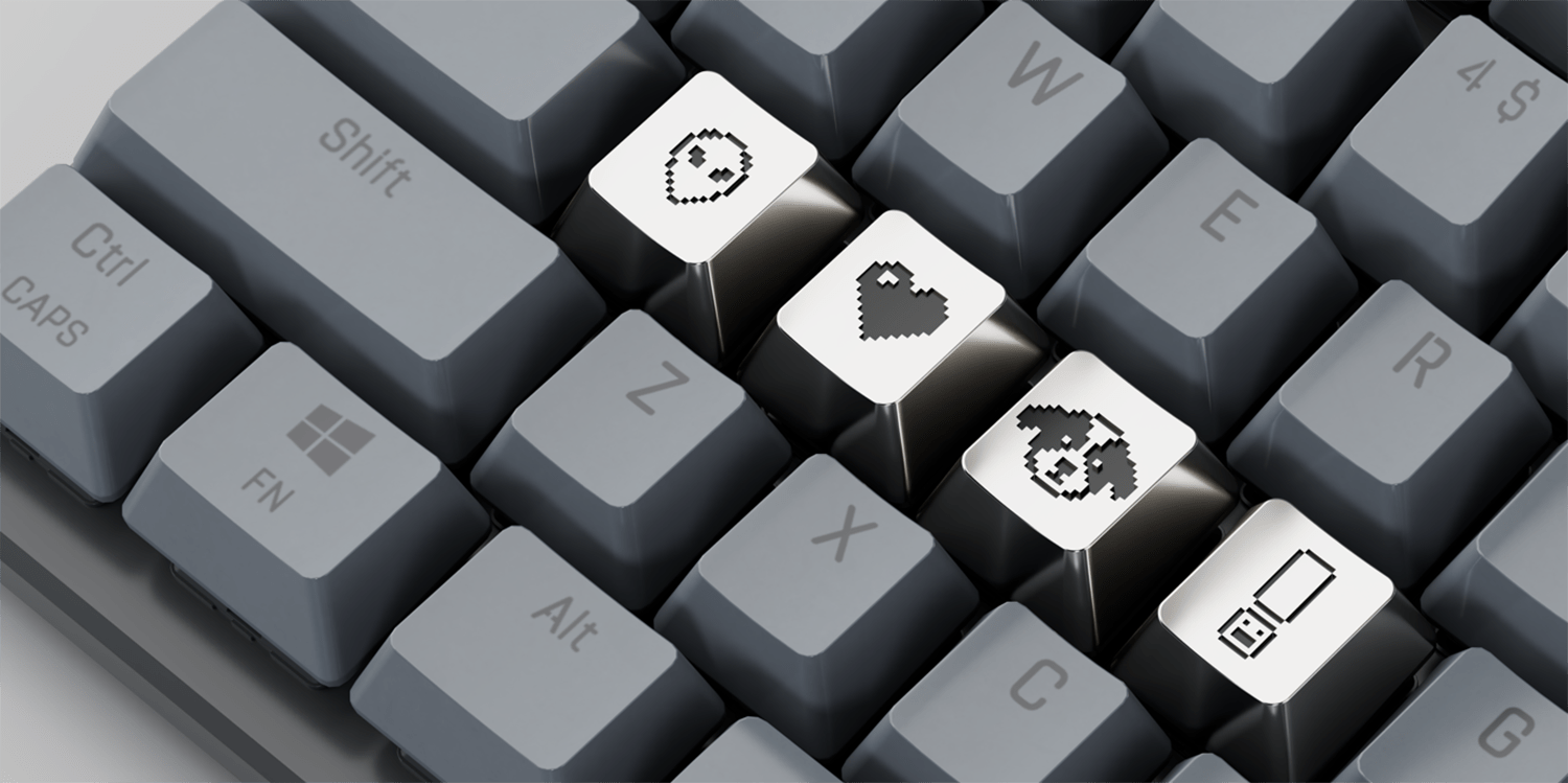 Mac icon creator Susan Kare adds cute, pricey keycaps (shown here in silver) to fun prints and more